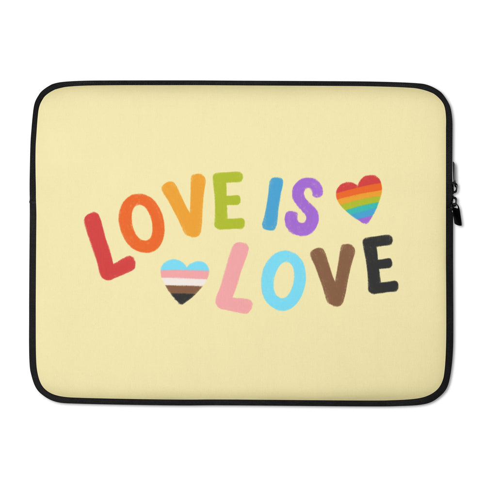 Front view of a pale yellow laptop sleeve reading “LOVE IS LOVE,” with rainbow-striped hearts