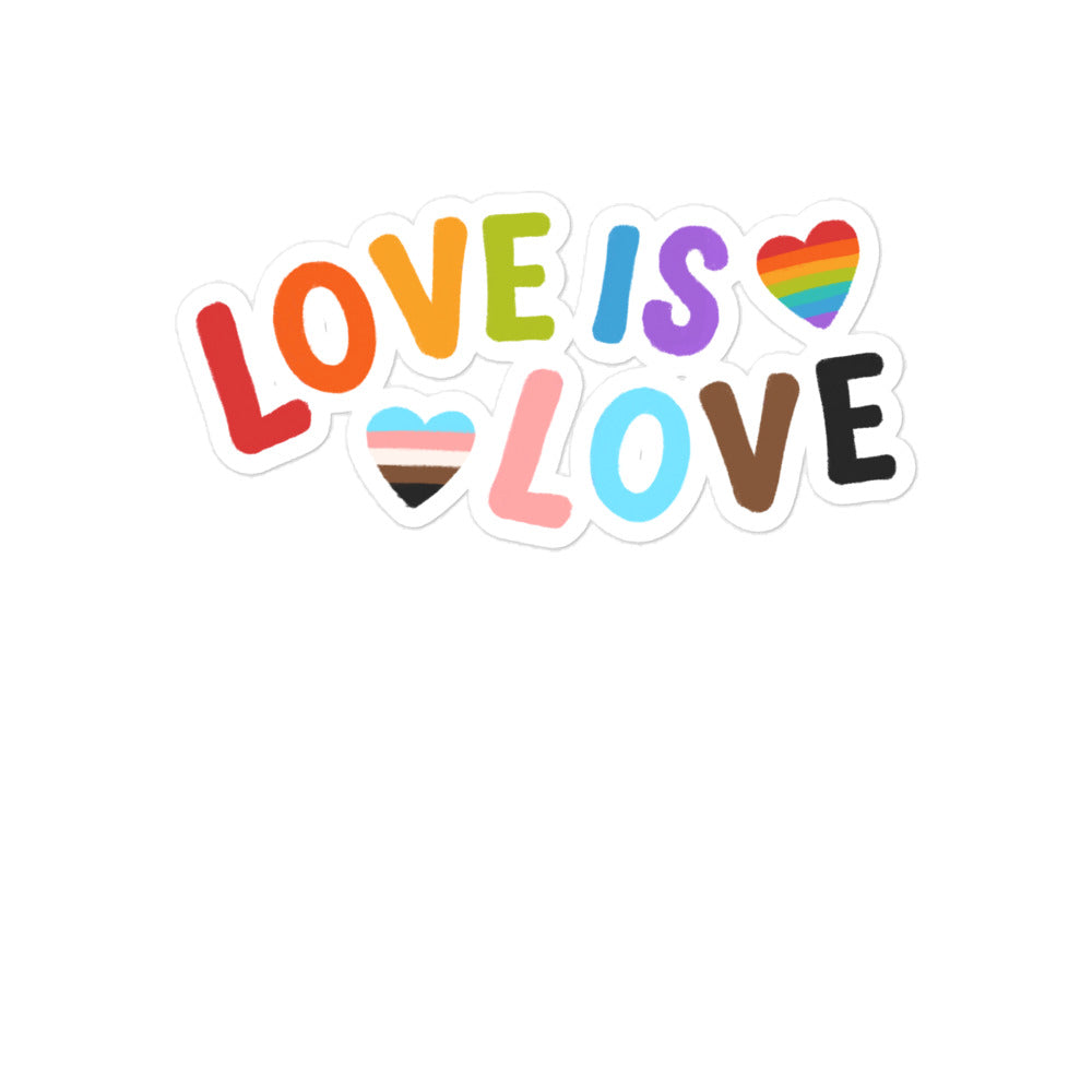 Flat-lay sticker set reading “LOVE IS LOVE,” with rainbow and progress pride hearts