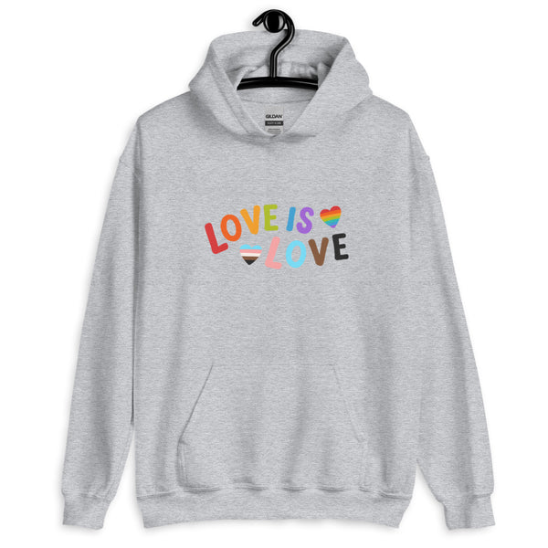 Front view of a gray hoodie reading “LOVE IS LOVE” with rainbow heart accents