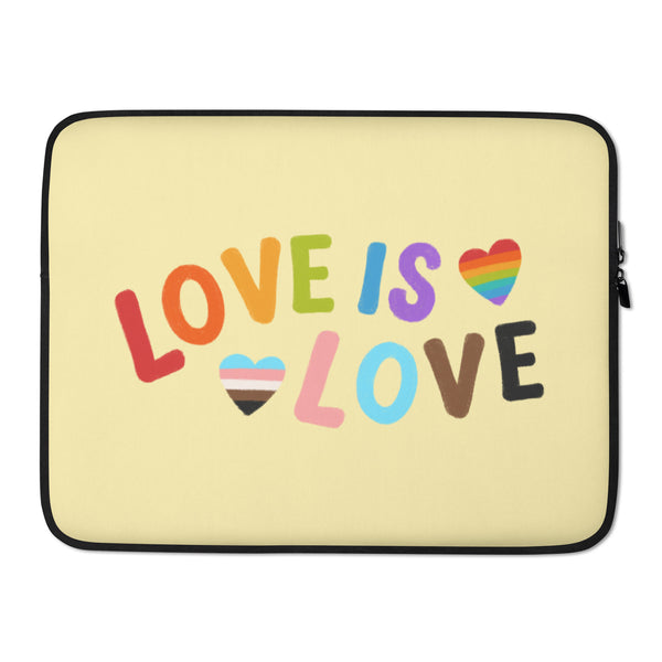 Front view of a pale yellow laptop sleeve reading “LOVE IS LOVE,” with rainbow-striped hearts