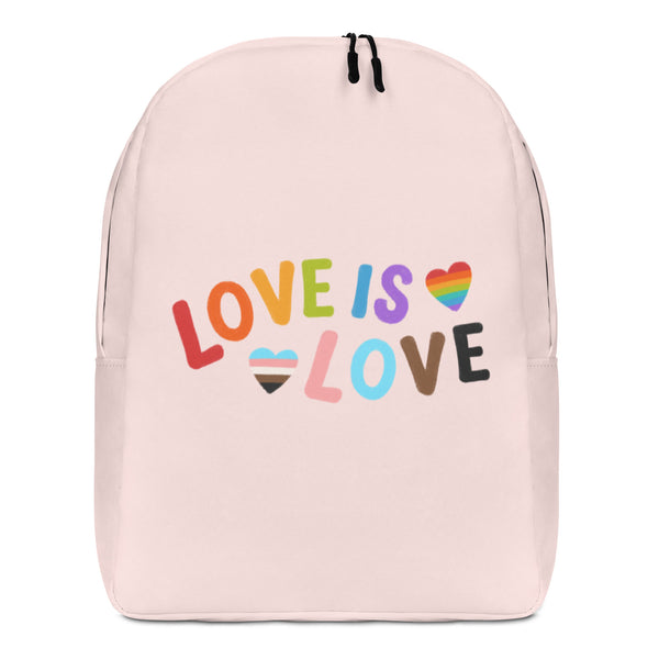 Front view of a pale pink backpack with colorful “LOVE IS LOVE” lettering and heart symbols