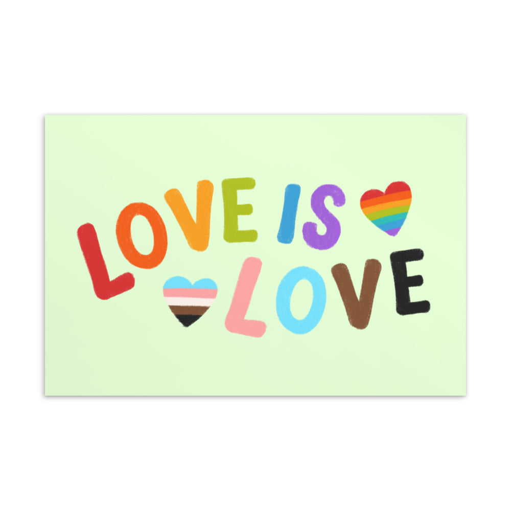 Front of a pale green postcard reading “LOVE IS LOVE” with two rainbow-striped hearts.