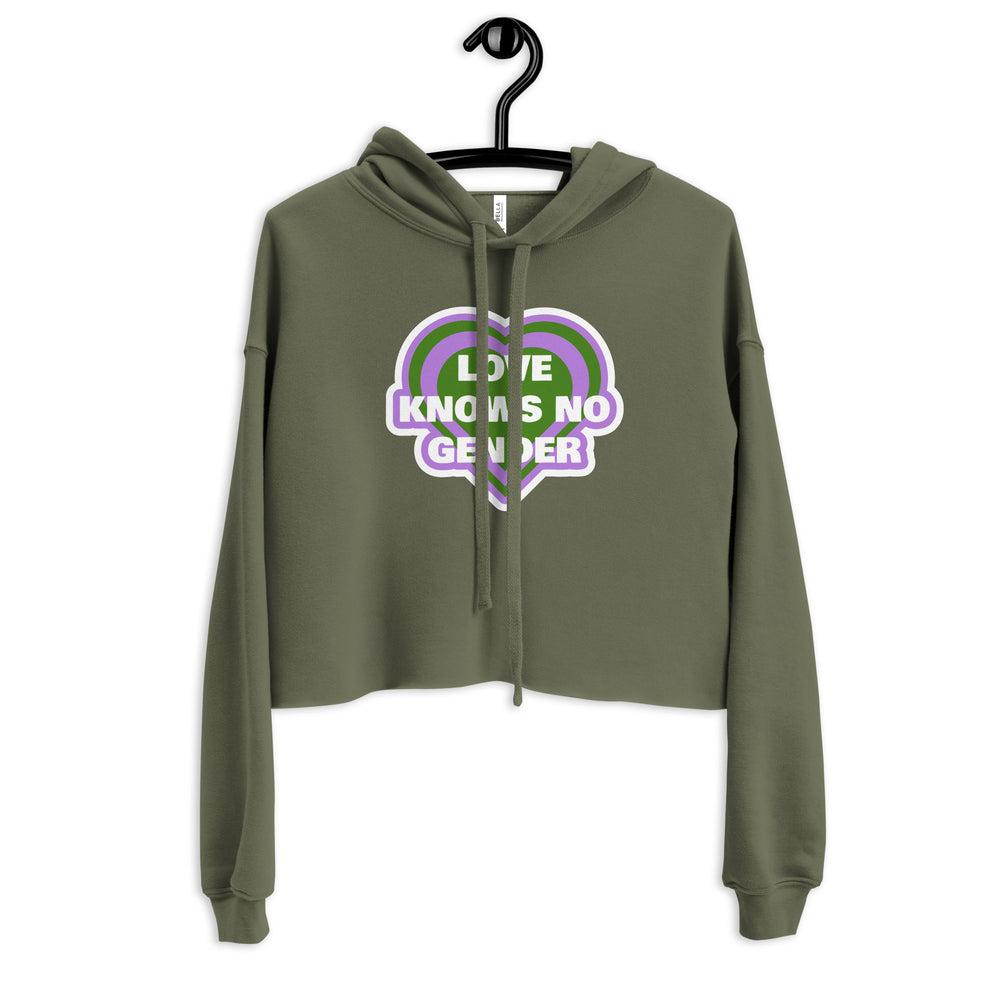 Front view of an olive-green cropped hoodie with a heart graphic reading “LOVE KNOWS NO GENDER.”