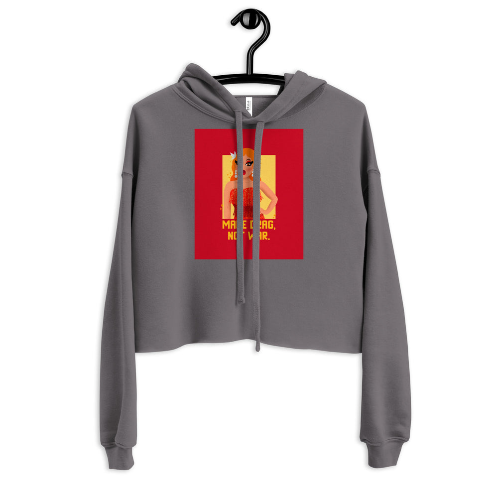 Front view of a gray cropped hoodie on a hanger with a drag-themed graphic reading “MAKE DRAG, NOT WAR.”