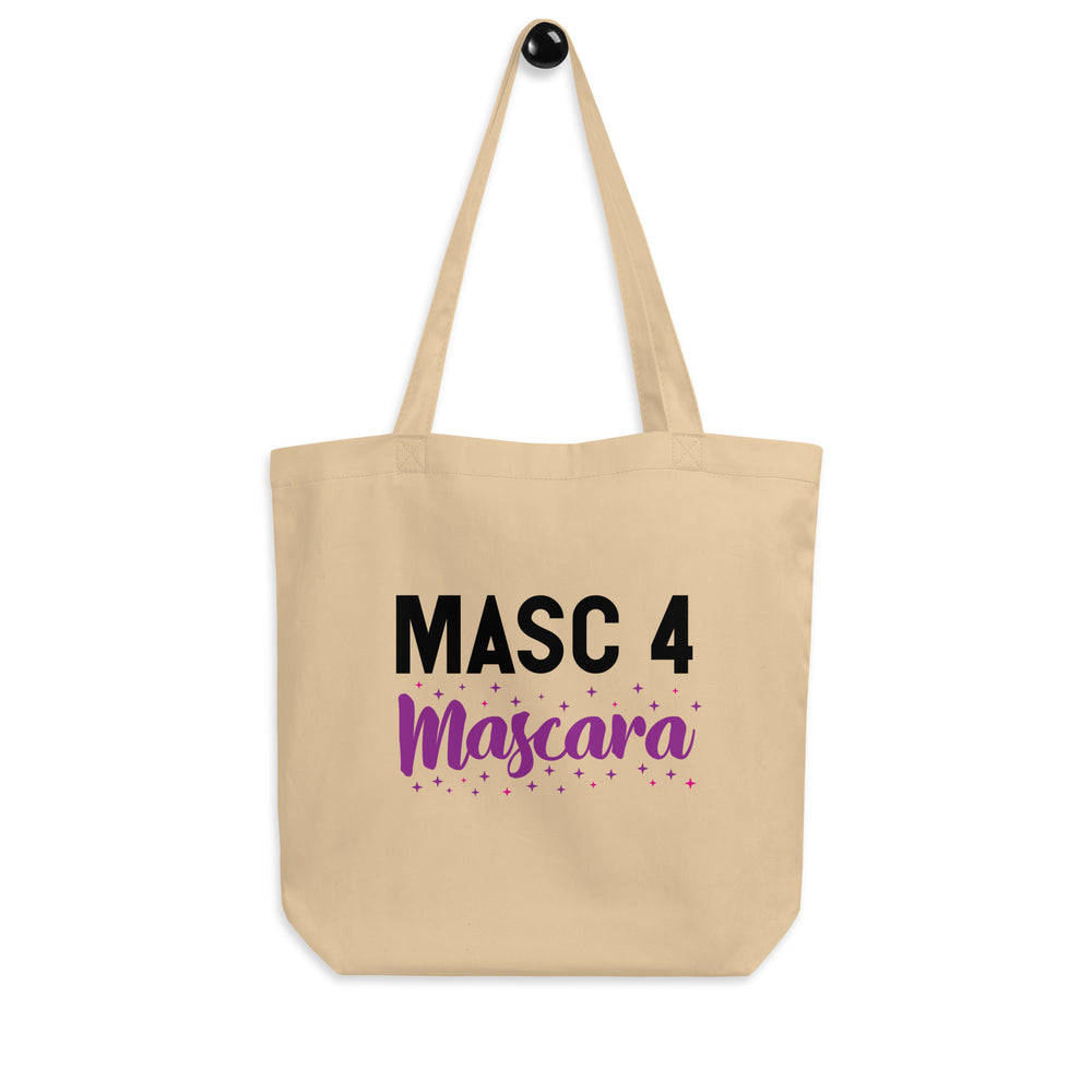 Front view of a beige tote bag reading “MASC 4 Mascara” with colorful stars