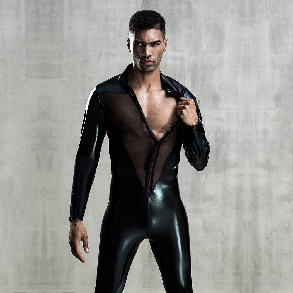 Front-facing model wearing a black sheer mesh and glossy bodysuit