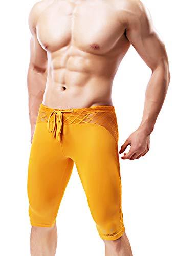 Yellow mesh compression shorts with crisscross waistband and drawstring, worn by a model