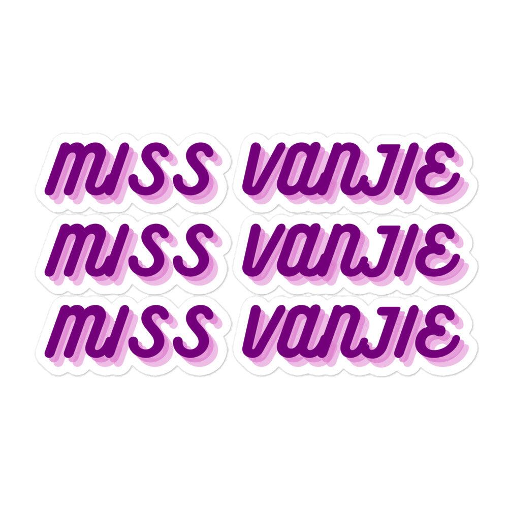 Flat lay of six purple-and-pink stickers reading “MISS VANJIE”