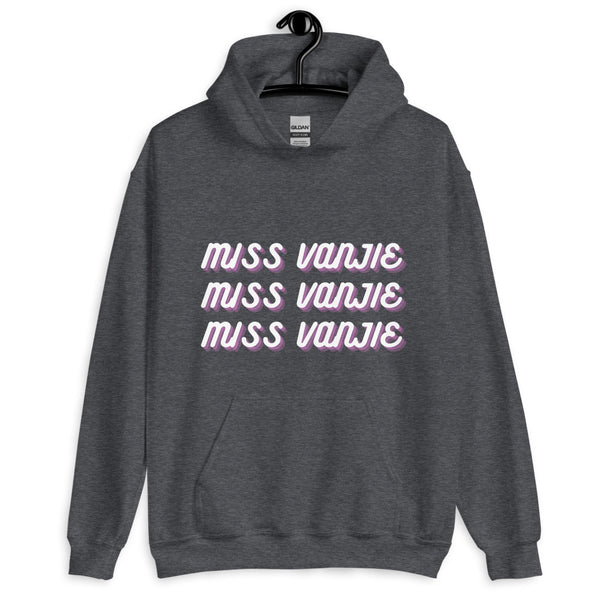 Front view of a dark gray hoodie reading “MISS VANJIE” three times