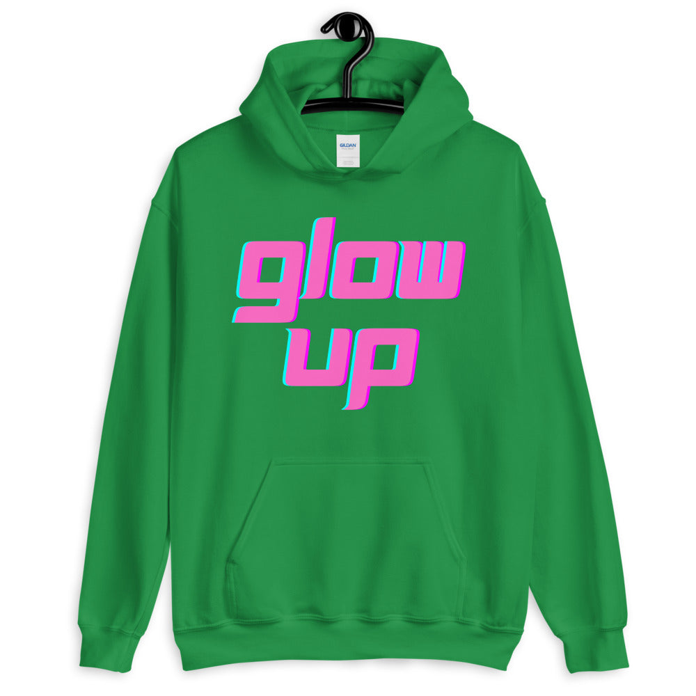 Green pullover hoodie with pink and cyan “glow up” lettering and a front kangaroo pocket