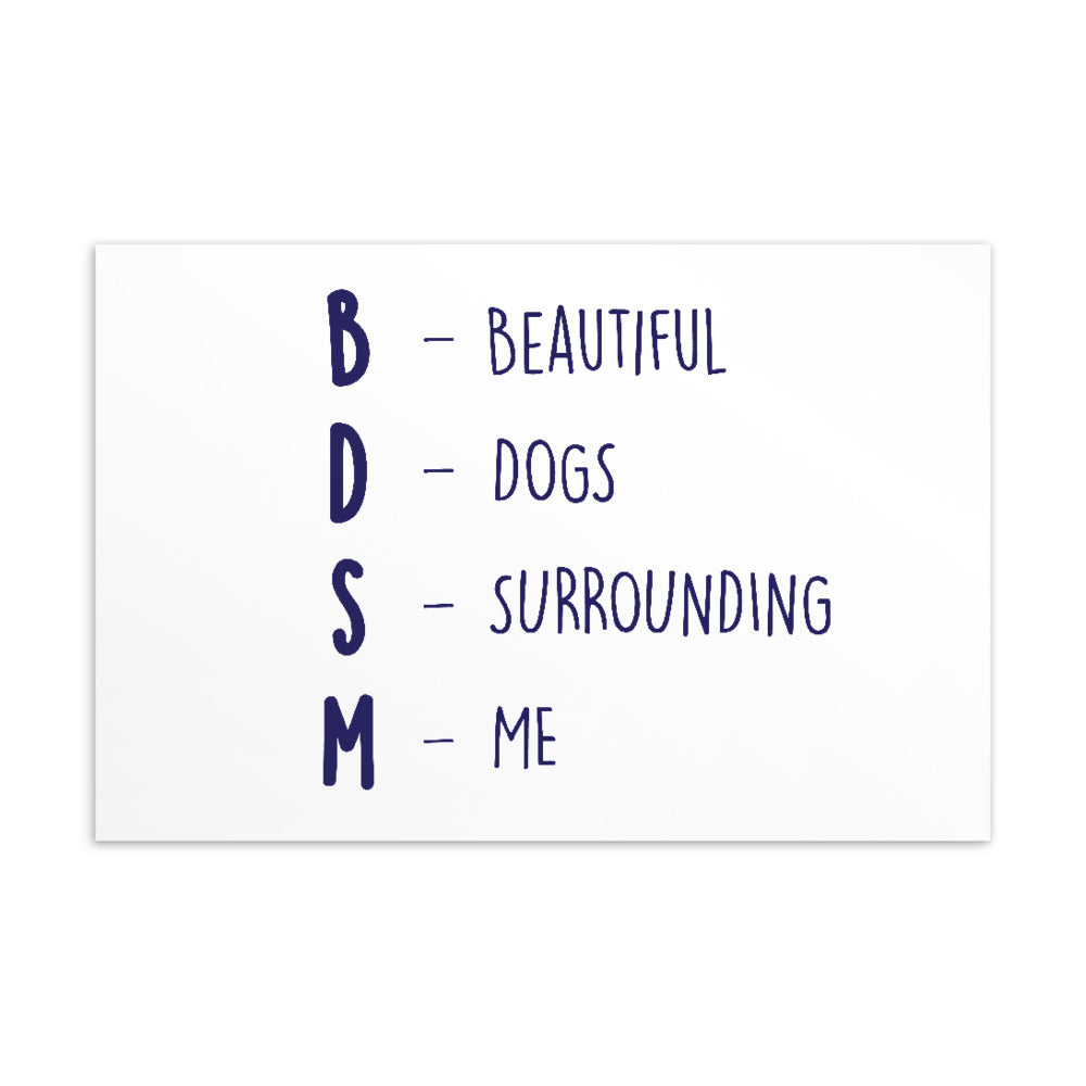 White postcard with blue text expanding BDSM as “Beautiful Dogs Surrounding Me”