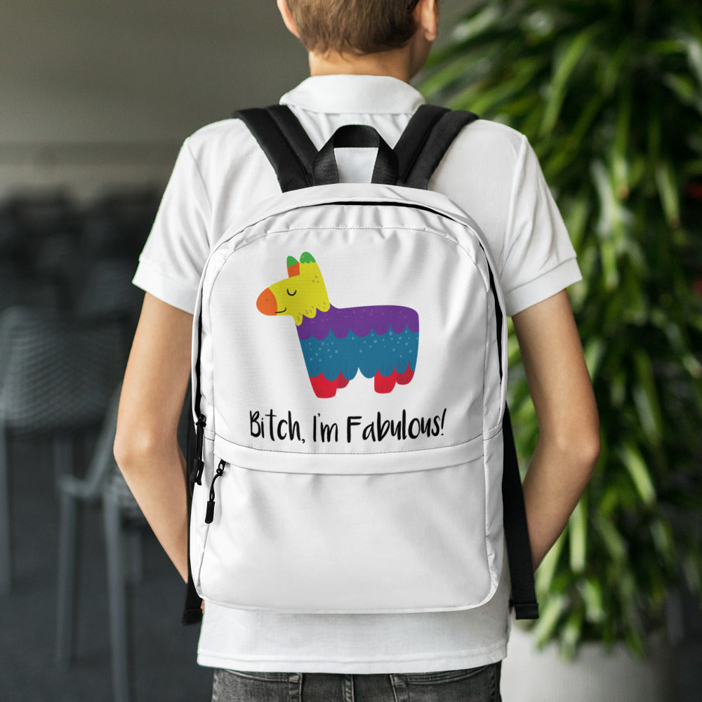 Model wearing a white backpack with a colorful piñata and “Bitch, I’m Fabulous!” slogan