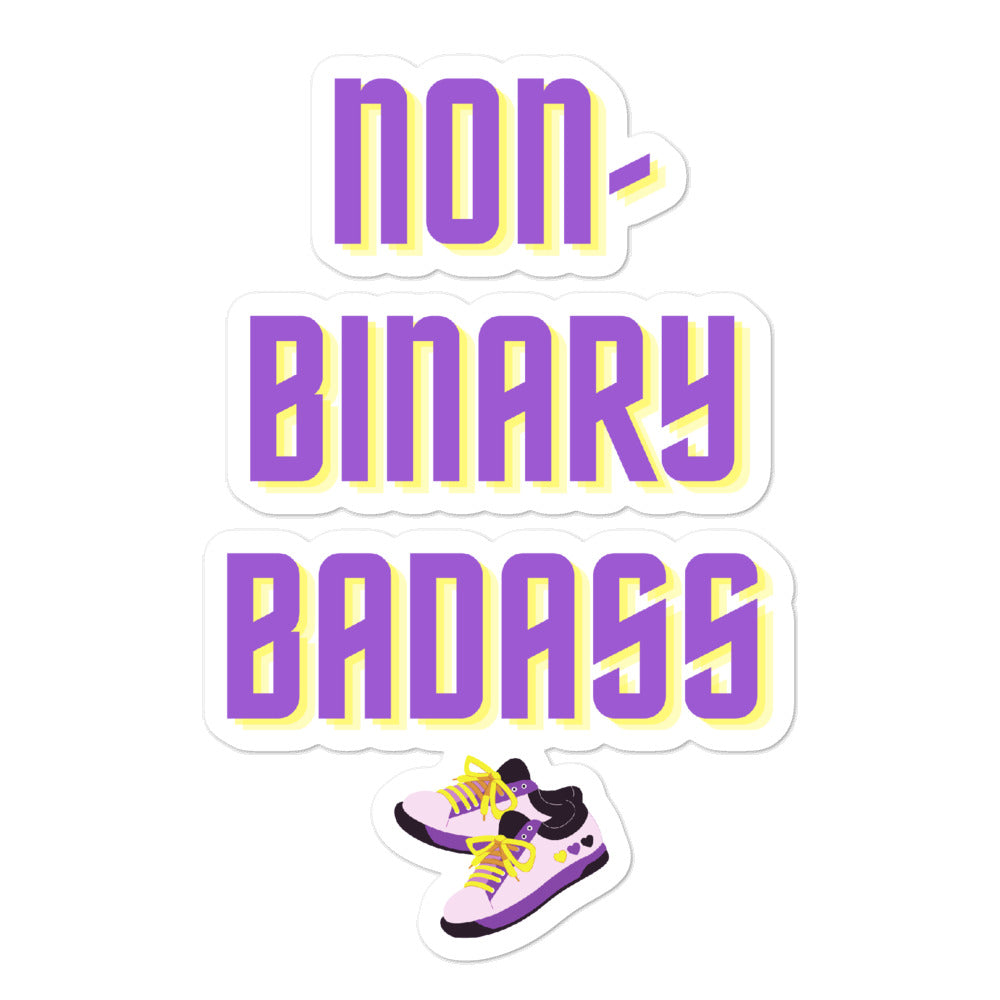 Non-binary sticker reading “non binary badass” with purple-and-yellow sneakers