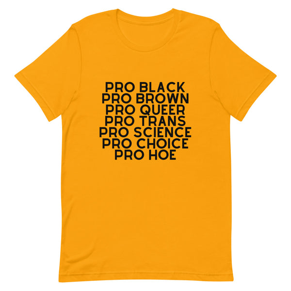 Orange T-shirt with black text reading “PRO BLACK, PRO BROWN, PRO QUEER, PRO TRANS, PRO SCIENCE, PRO CHOICE, PRO HOE”