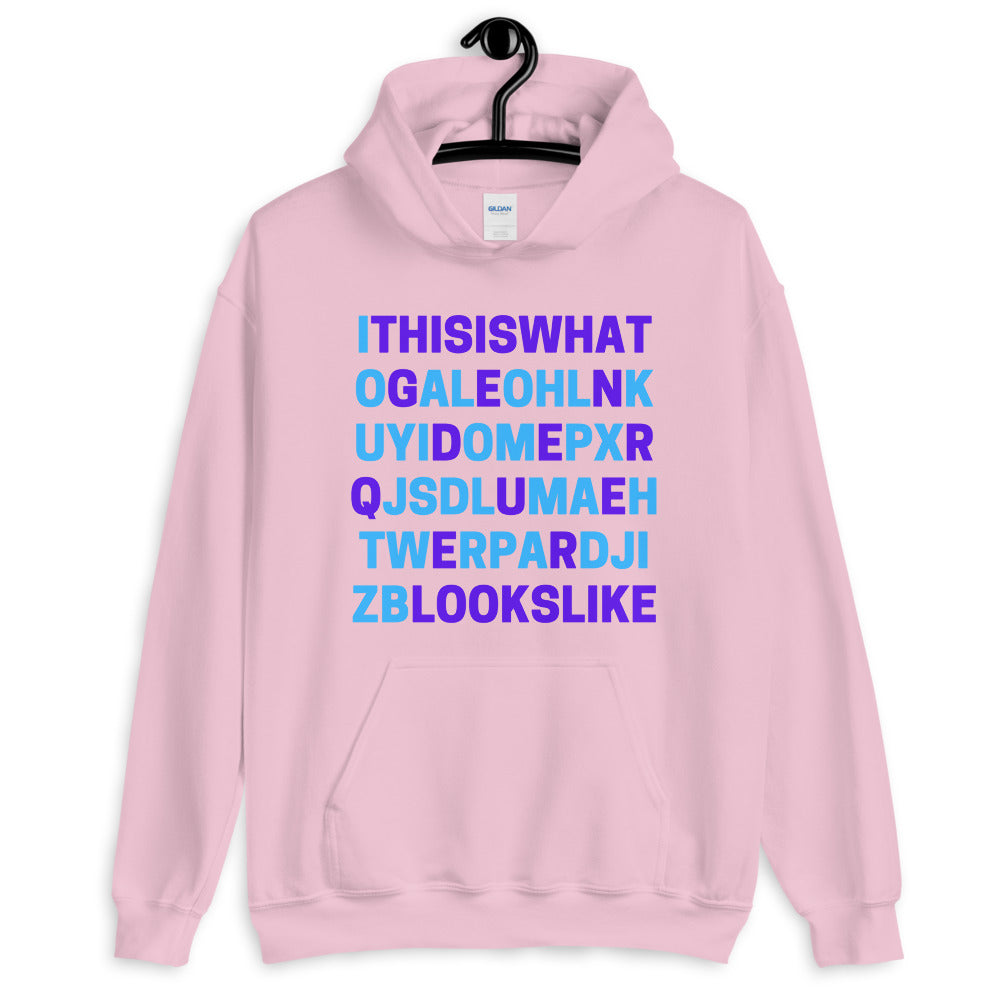 Pink unisex hoodie with blue and purple “This Is What GenderQueer Looks Like” text