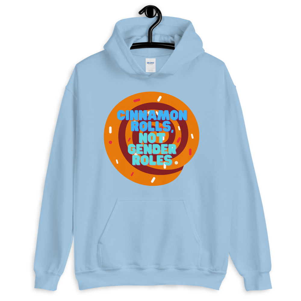 Light blue hoodie on a hanger with a cinnamon roll graphic reading “CINNAMON ROLLS, NOT GENDER ROLES.”