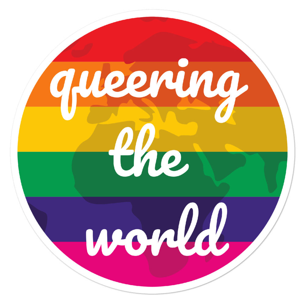 Round rainbow sticker reading “Queering the world” over a world map silhouette