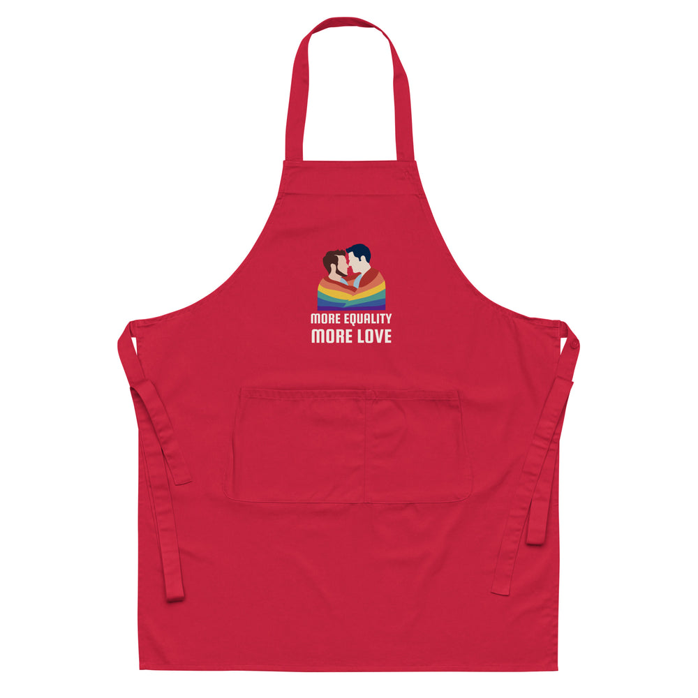 Front view of a red apron with a kissing couple, rainbow stripes, and “MORE EQUALITY MORE LOVE” text