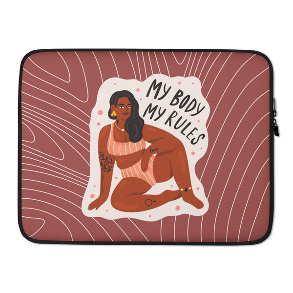 Front view of a laptop sleeve reading “MY BODY MY RULES,” with a seated illustrated woman