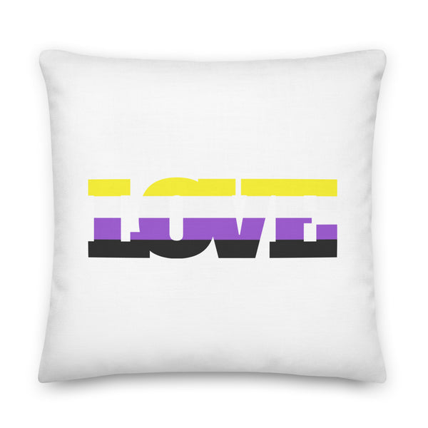 White square pillow with bold yellow, purple, and black abstract lettering