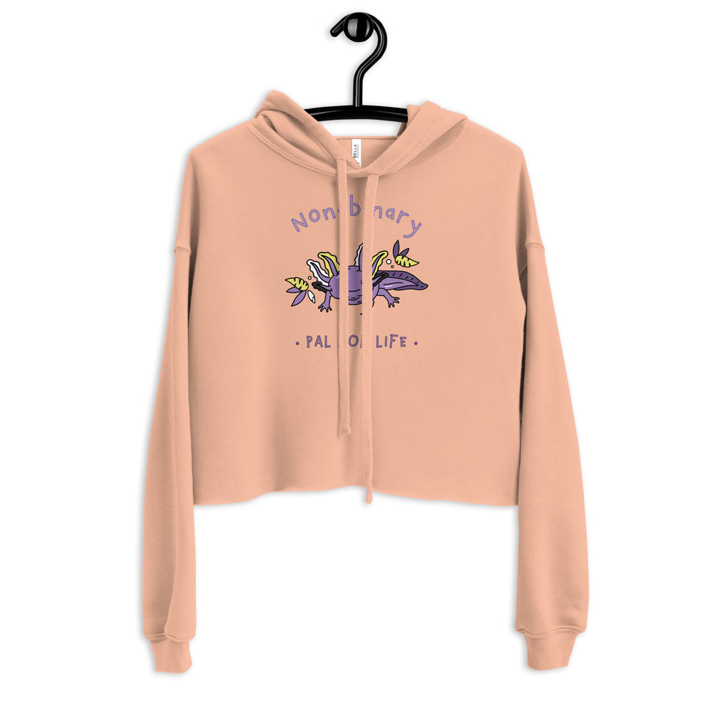 Peach cropped hoodie on a hanger with “Non-Binary Pal For Life” and a purple salamander graphic
