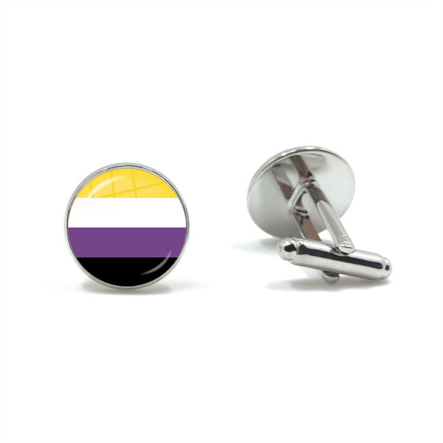 Pair of round nonbinary pride flag cufflinks, one facing forward and one showing its silver toggle