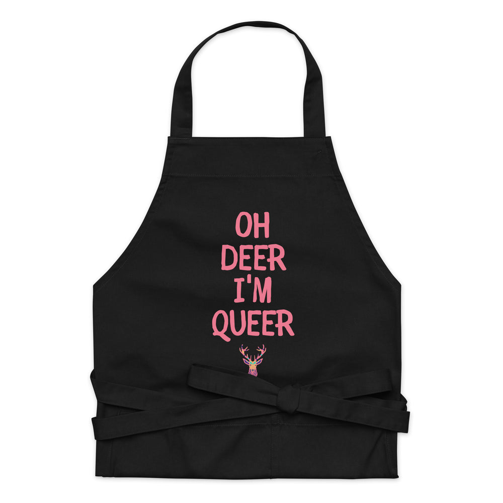 Front view of a black apron reading “OH DEER I’M QUEER” in pink above a deer illustration