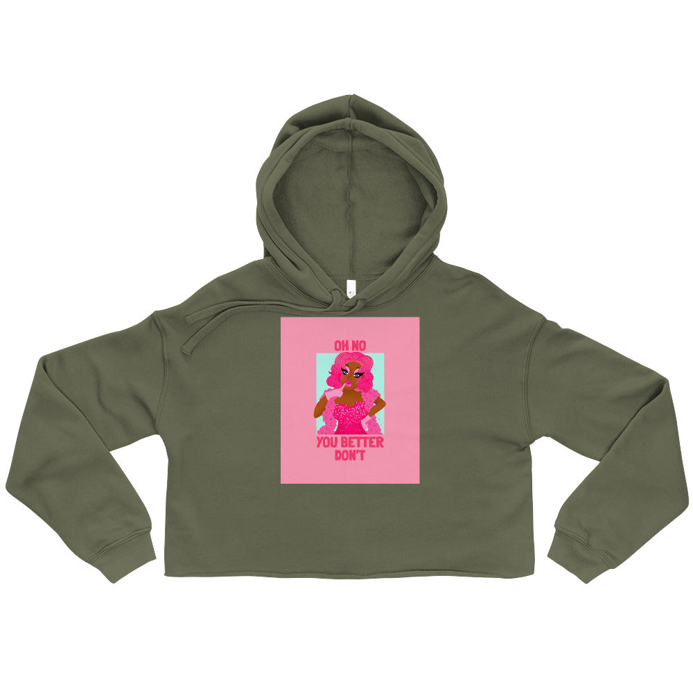 Flat-lay olive green cropped hoodie with a pink drag-queen graphic reading “OH NO YOU BETTER DON’T”