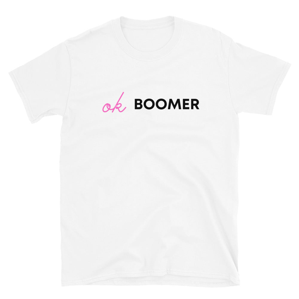 White T-shirt with pink script and black block lettering reading “ok BOOMER”