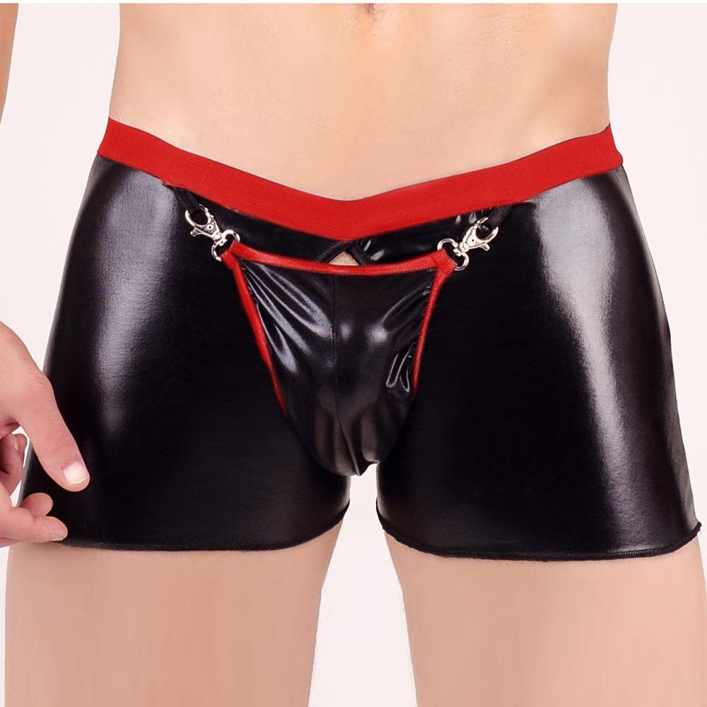 Front view of a model wearing black glossy open-crotch boxer shorts with red trim