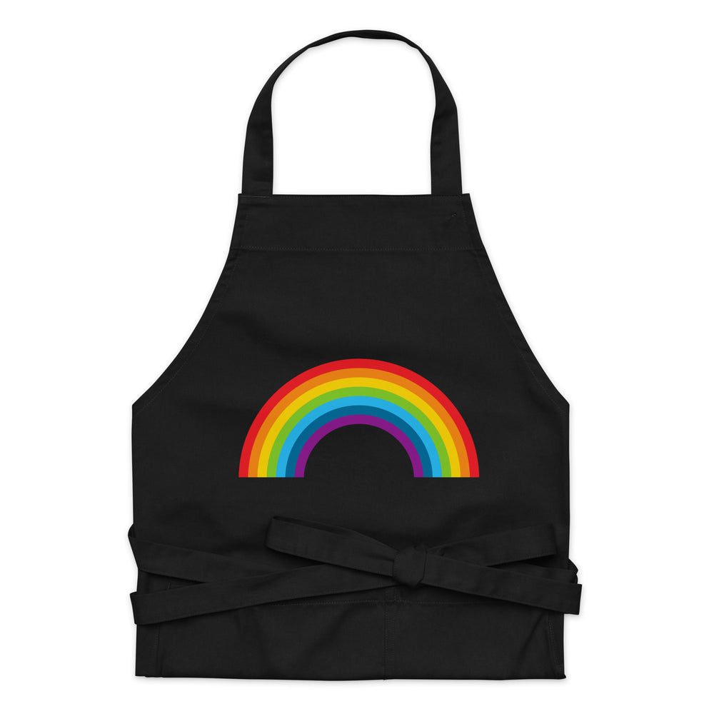 Front view of a black apron with a rainbow arch graphic and long waist ties
