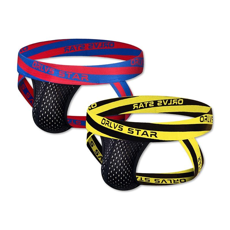 Two black mesh jockstraps with contrasting red-blue and yellow-black logo waistbands