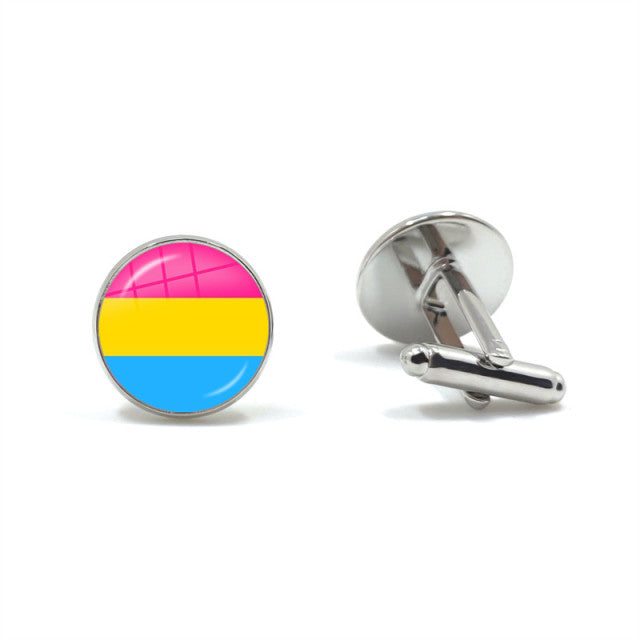 Pair of silver cufflinks, one showing pink, yellow, and blue horizontal stripes