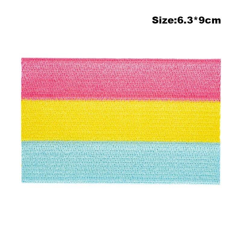 Close-up of a pink, yellow, and blue pansexual pride embroidered iron-on patch