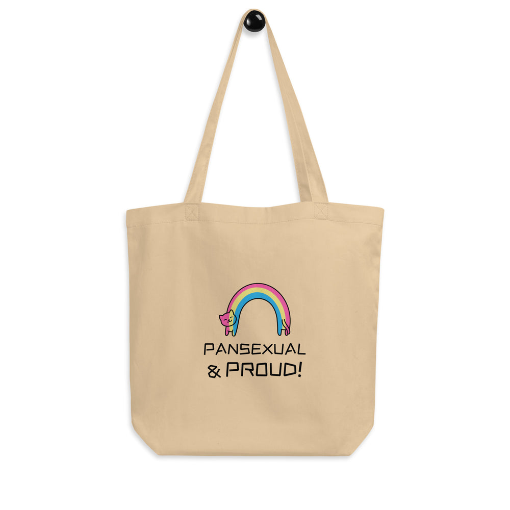 Front view of a beige tote bag with a rainbow cat graphic and “PANSEXUAL & PROUD!” text