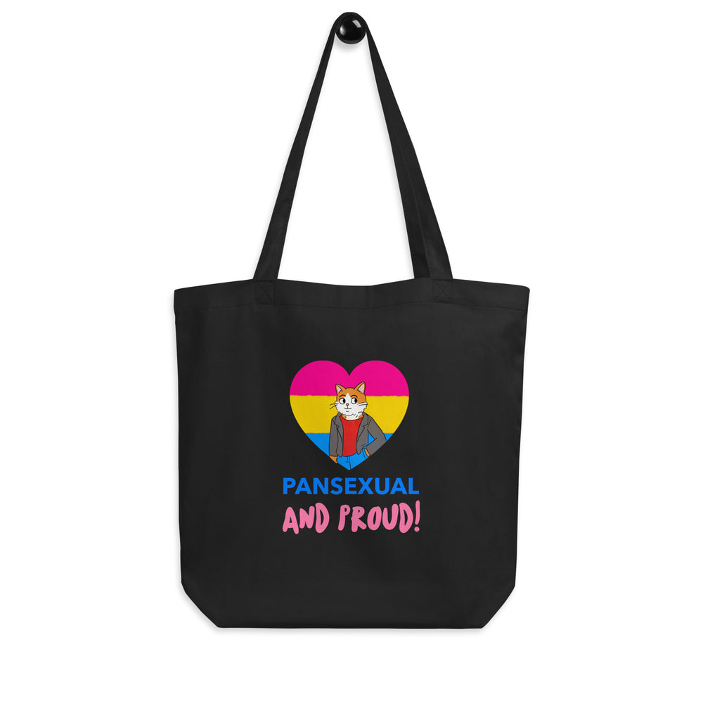 Front view of a black tote bag with a pansexual flag heart, cat illustration, and “PANSEXUAL AND PROUD!”