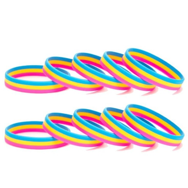 Five pink, yellow and blue pansexual pride rubber wristbands arranged in two rows