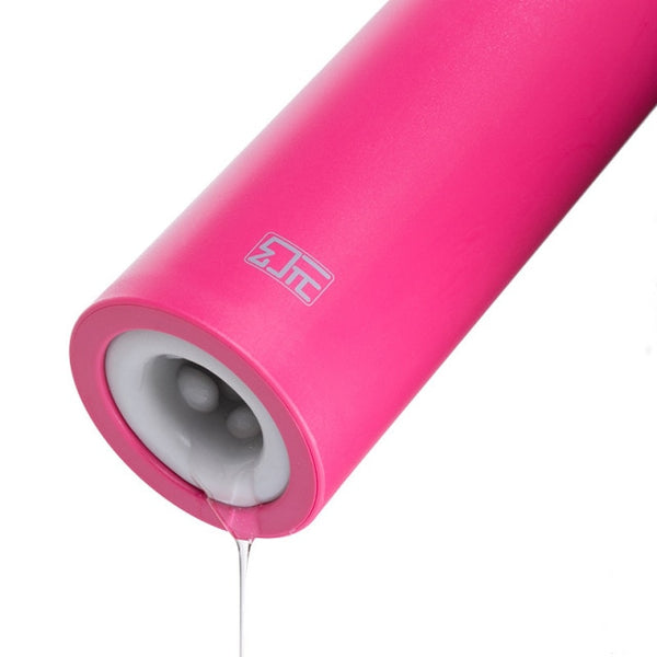 Close-up of a bright pink penis masturbator with a gray textured opening
