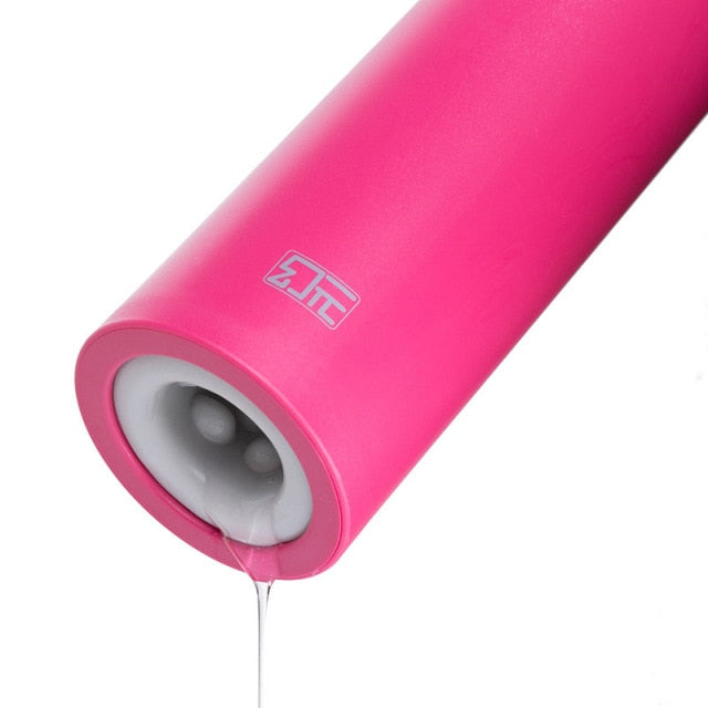 Close-up of a bright pink penis masturbator with a gray textured opening