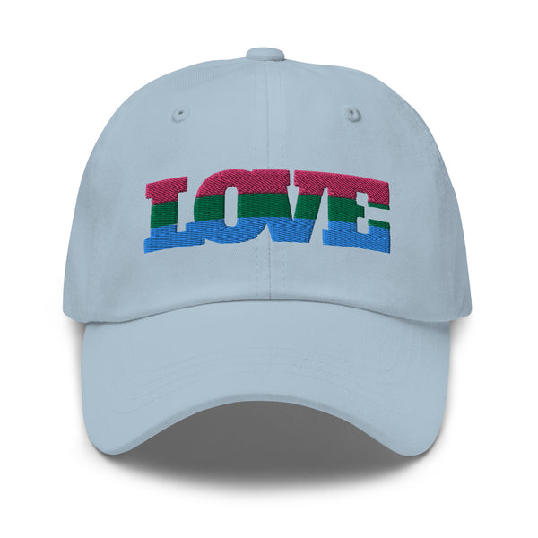 Front view of a light blue baseball cap embroidered with “LOVE” in pink, green, and blue