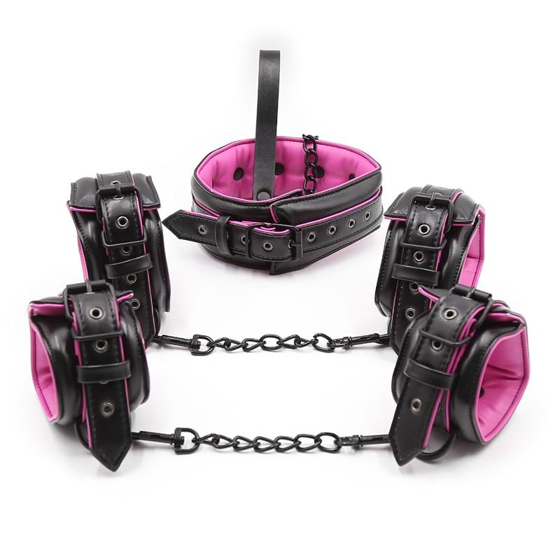 Black and purple pup play set with padded collar, wrist cuffs, ankle cuffs, and chains