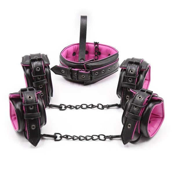 Black and purple pup play set with padded collar, wrist cuffs, ankle cuffs, and chains