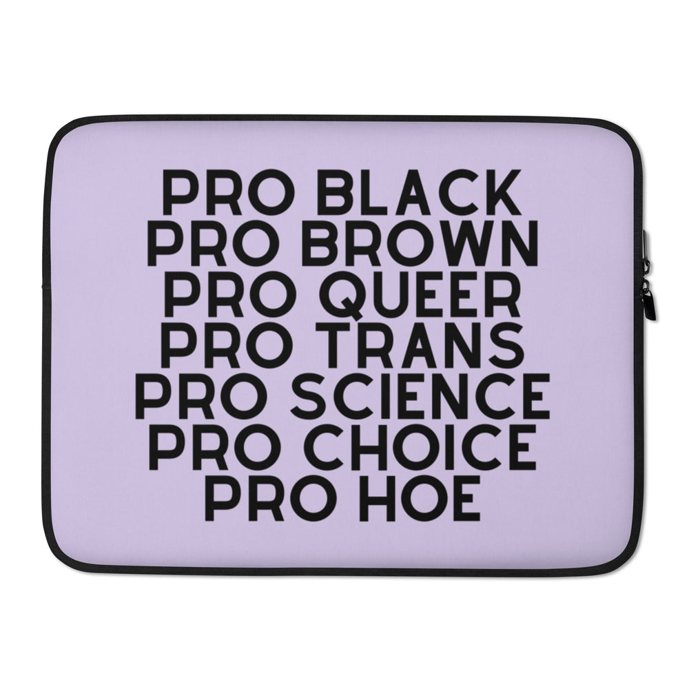 Lavender laptop sleeve with black border and stacked text: “PRO BLACK,” “PRO BROWN,” “PRO QUEER,” “PRO TRANS,” “PRO SCIENC...