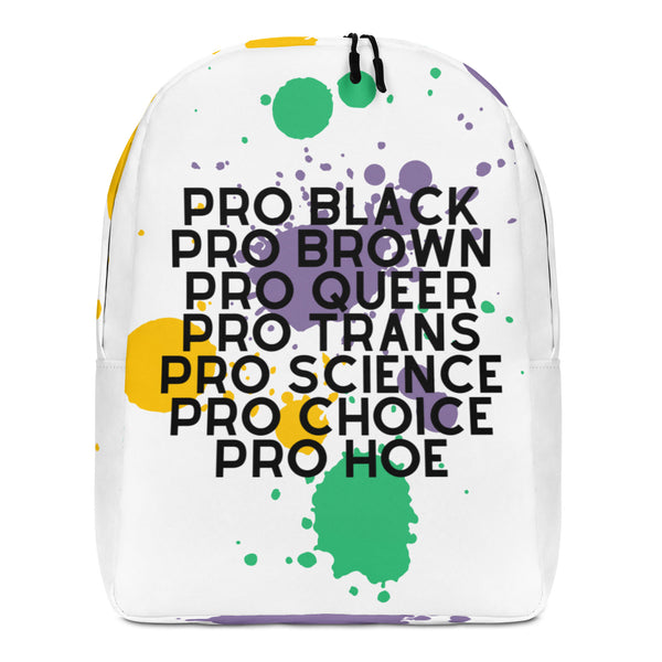 Front view of a white backpack with colorful paint splatters and bold black text: “PRO BLACK PRO BROWN PRO QUEER PRO TRANS...