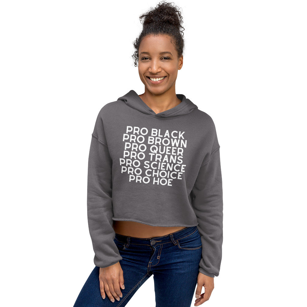 Model wearing a gray cropped hoodie reading “PRO BLACK PRO BROWN PRO QUEER PRO TRANS PRO SCIENCE PRO CHOICE PRO HOE”