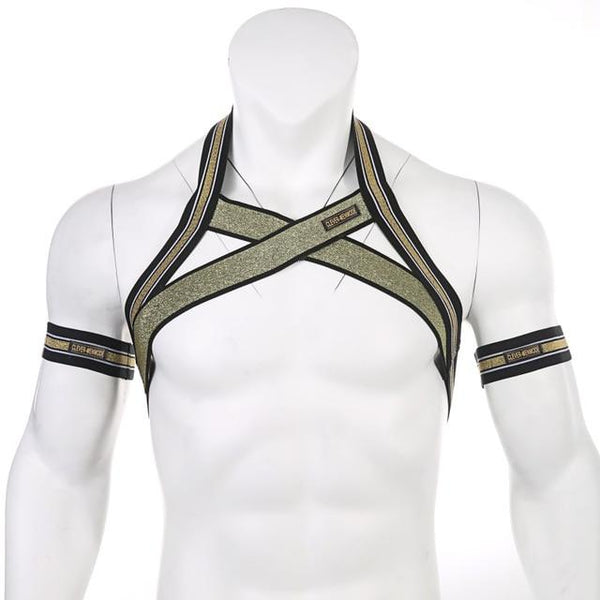 Black and gold elastic chest harness with crossed straps and matching upper-arm bands