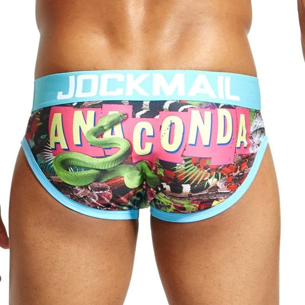 Close-up of colorful Anaconda briefs with a green snake print and turquoise waistband