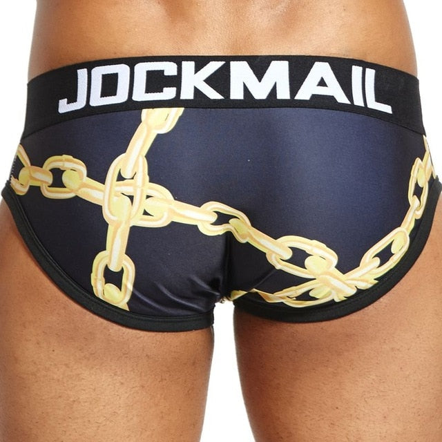 Black Jockmail briefs with an all-over gold chain print
