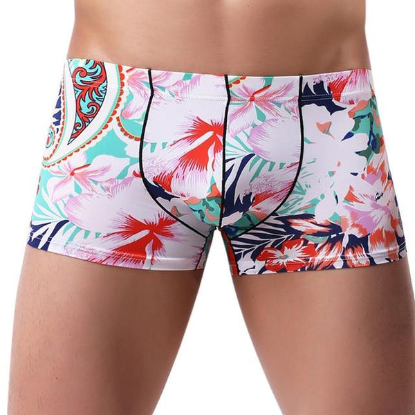 Floral print boxer briefs with colorful tropical flowers and black seam detailing