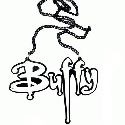 Black acrylic “Buffy” statement necklace with stylized Gothic lettering on a chain